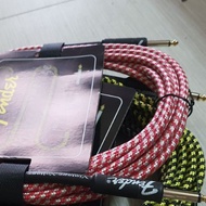 Fender line wire, jack wire connecting from guitar via amplifier