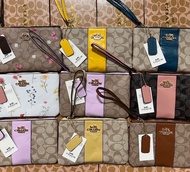 *พร้อมส่ง*กระเป๋าสตางค์coach ผู้หญิง ซิป1ช่อง ใบกลาง ขนาด7นิ้ว กระเป๋าคล้องมือโค้ช กระเป๋าใสโทรศัพท์