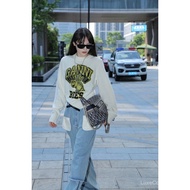 <[CDATA[Ganni Bee Pattern Pullover Sweater - Casual White Top | Trendy Unisex]]>