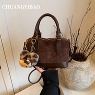 Elegant Suede Boston Handbag