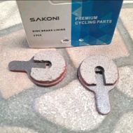 KAMPAS CAKRAM SAKONI - DISC BRAKE PADS SAKONI BULAT MERAH sparepart sepeda termurah