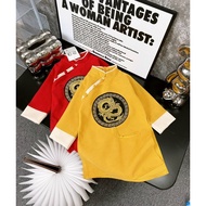 Boys' black round embroidered ao dai