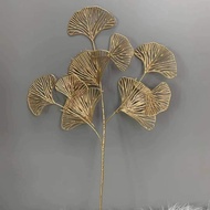 Golden fan branches decorate cake towers, water towers, ceremony towers