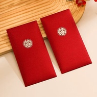 Sparkling round glitter red envelopes with the word Joy, red envelopes holding fruit, celebrating we