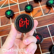 Chinese chess set and rosewood chess pieces.