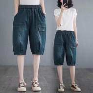 Jean shorts, dark blue begy mid-length jeans, active fashion style