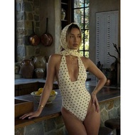 Polka dot bikini with towel