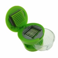 Sell Garlic Chopper multifunctional garlic press， garlic cutter， garlic chopper， kitchen gadget.