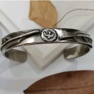 Stainless Steel Takahashi Goros Feather Bangle Bracelet.