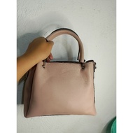 Dusto sling/hand bag .