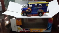 Die-cast metal pull-back action jeepney