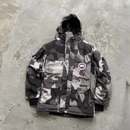 Canada Goose Men's and Women's Mid-length Thickened Warm Windproof Hooded Down Jacket