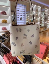 Coach 蒲公英印花水桶包 小巧精致