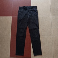Black GU chinos trousers. 006