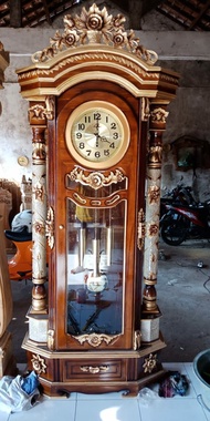 Invoice Jam Hias Bentuk Almari Berdiri Bahan Kayu Jati Ukuran 100 x 50 x 220