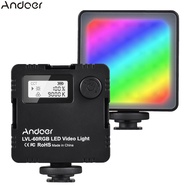 Andoer LVL-60RGB แฟลชวิดีโอ LED สองสีขนาดเล็ก2500K-9000K แบตเตอรี่แบบชาร์จไฟได้ในตัวที่สามารถหรี่แสงได้พร้อมหน้าจอ LCD ความเย็น3ตัวประกับติดไฟเติม Vlog สำหรับกล้อง DSLR