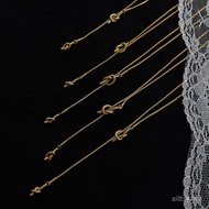 Fashionable long heart-shaped knot sweater necklace