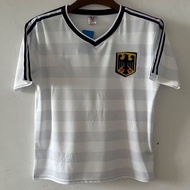 เสื้อเจอร์ซีย์ฟุตบอลแบบย้อนยุคเสื้อเจอร์ซีย์ชายเสื้อแขนสั้น1984เยอรมันใส่ไปบ้าน