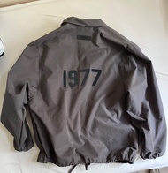 Fear of God Essentials coach jacket