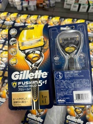 Dao cạo râu 5 lưỡi Gillette Fusion Proglide Proshield Vàng Cam Fusion Skinguard trắng Nhật Bản (2 đầ