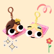 Headphone Case Hanging On A Bag With The Crying Baby Brand