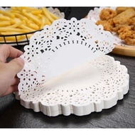 Round perforated patterned oil-absorbing paper used to line food, make cakes, and line oil-free frye