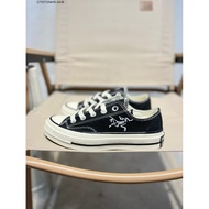 Fashionable 1970s Inspired Co-Branded Chuck Taylor Sneakers with Anti-Slip Sole