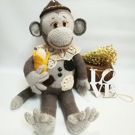 Stuffed animal knitted Monkey with banana in vintage style, toys as a gift