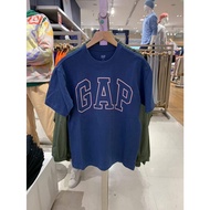 เสื้อยืดแขนสั้นผู้ชาย Gap ทรงหลวมโลโก้เสื้อลำลองเสื้อยาวปิดถึงก้นใหม่
