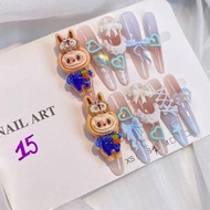 015 - 3D labubu charm fake nails mixed in pink and blue, luminous bow stones Suitable for photograph