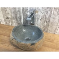 River stone wash basin | River stone sink