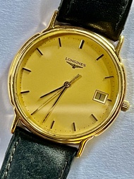 นาฬิกามือ 2 วินเทจ LONGINES  ( ลองจินส์) ตัวเรือนเป็นทองคำ ทองตันๆ แท้ 18 K,  80% หน้าปัด ทรงกลม ขนาดตัวเรือน 34 มมสาย ยาว 23 ซม, กลไกทำงานระบบควอทซ์