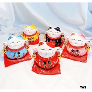 God of Wealth Cat holds rings (saving).