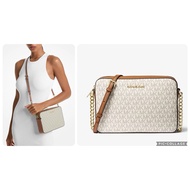 MK Sling Crossbody bag