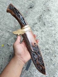 pisau kukri ukir kayu rasmala bahan baja