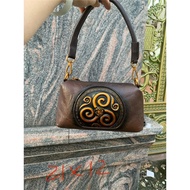 DC Engraved leather shoulder bag and crossbody bag