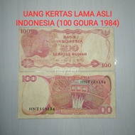 UANG KERTAS LAMA INDONESIA 100 RUPIAH 1984 GOURA DUIT KUNO ASLI MAHAR