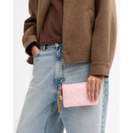 Wristlet with Corner Zip and Charms in Signature Canvas (CEF72)