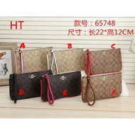 Coach 65748
Coach women handbag Clutch bag