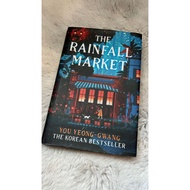 PRELOVED BOOK- THE RAINFALL MARKET- YOU YEONG-GWANG