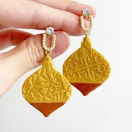 White Christmas Medium Gold Textured Bauble Earrings