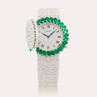 Piaget Reference 9177 A6 | A white gold, emerald and diamond-set bracelet watch with concealed dial,