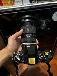 Nikon FA Red D model with lens