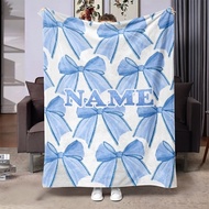A Personalized Blanket with a Light Blue Bow Symbolizes Meaning