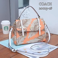 Coach sling handbags