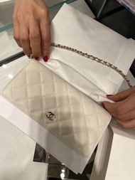 Chanel white caviar WOC champagne gold chain