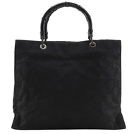 กระเป๋าถือ Gucci GG Tote Bag รุ่น 002.1010 ทำจากไม้ไผ่และไนลอน สีดำ ขนาด A5 เปิดได้ ลาย GG สำหรับผู้