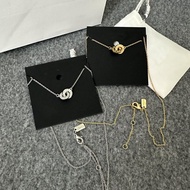 C0a€h Ring Necklace