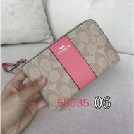 ของแท้100% แบรนด์อเมริกาขนาด: 16*11เซนติเมตร F58035มุมซิปคล้องข้อมือสายหนังรถม้าผู้หญิงกระเป๋าเงินใส