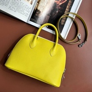 ::HERMES:: 萊姆黃拼色粉白拉鍊柏莉包 Bolide 25